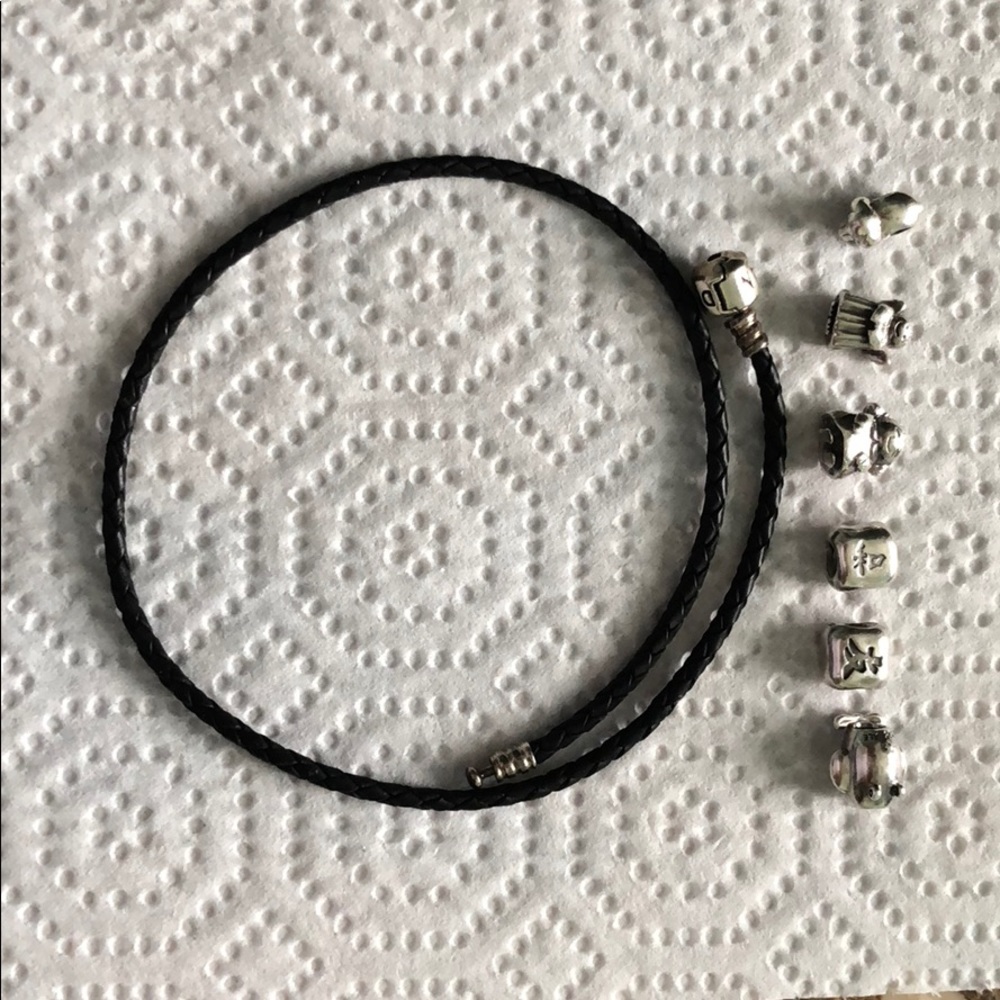 Pandora leather wrap bracelet and charms